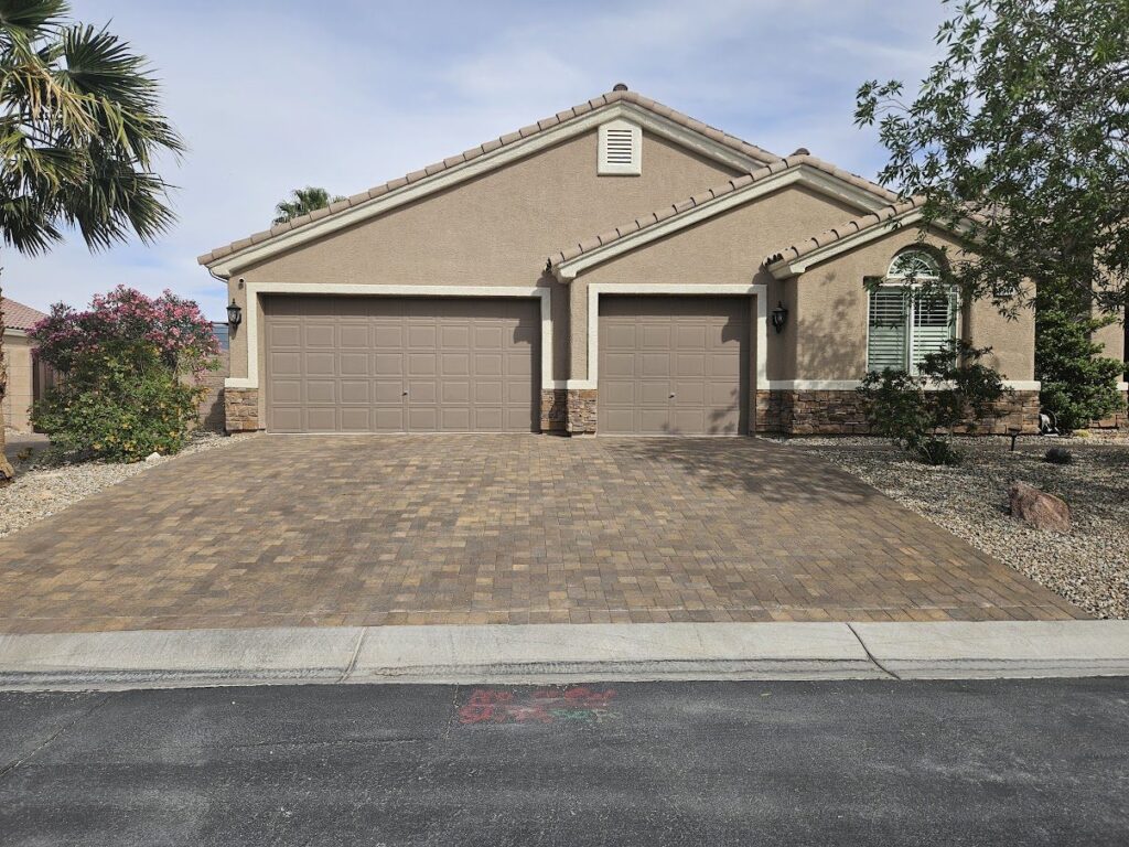 Finished paver driveway boosting curb appeal at a Las Vegas home by FreshStart Landscaping