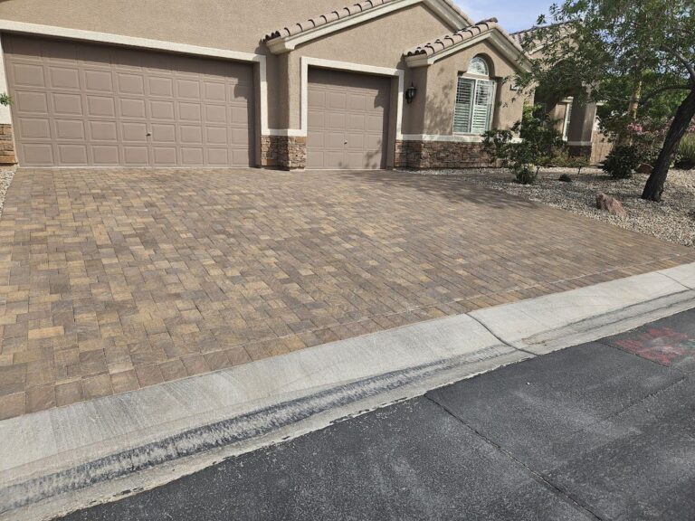 Finished paver driveway at a new Las Vegas home by FreshStart Landscaping